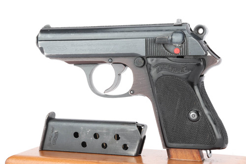 End-of-production dural Walther PPK with black grip - left side with magazine