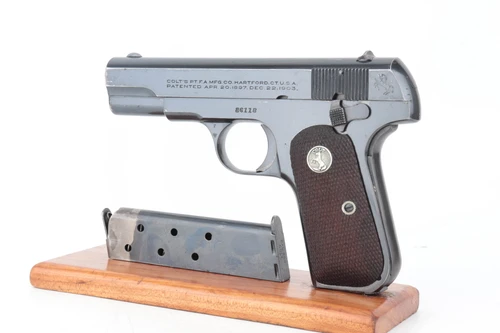Colt Model 1908 Pocket Hammerless pistol with box - left side with magazine