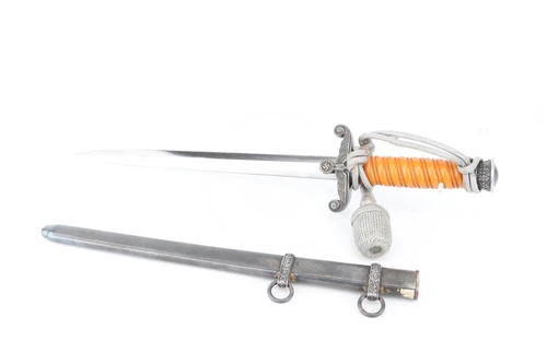Army dagger with burnt-orange celluloid grip