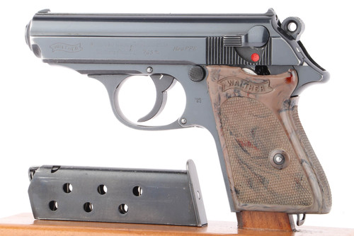 1943 Walther PPK Police Eagle/C 7.65mm pistol - left side view with gray grip and Walther banner magazine
