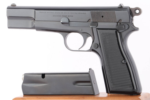 1965 FN Browning High Power T series 9mm pistol - left side view with magazine
