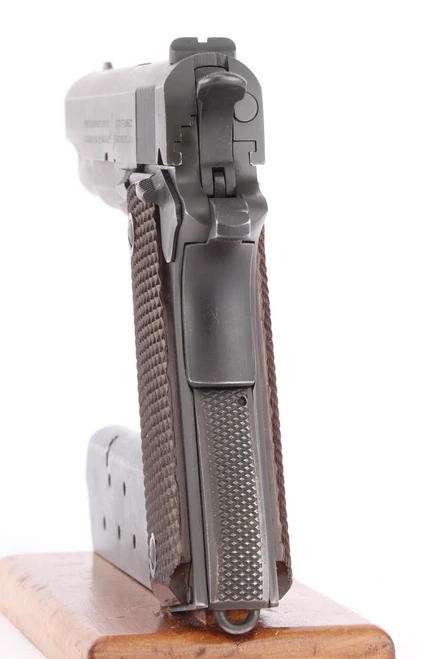 1943 Colt Model 1911A1 .45 ACP pistol - rear view of the grip safety and mainspring housing