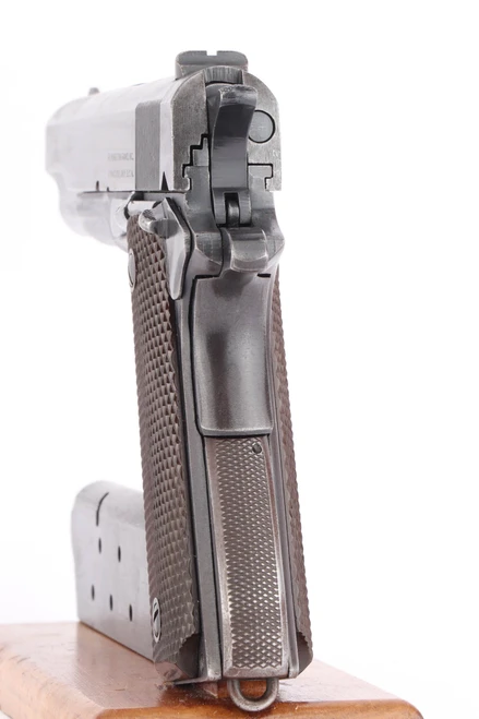 1943 Remington Rand 1911A1 2nd variation .45 ACP pistol - rear view of the grip safety and back strap