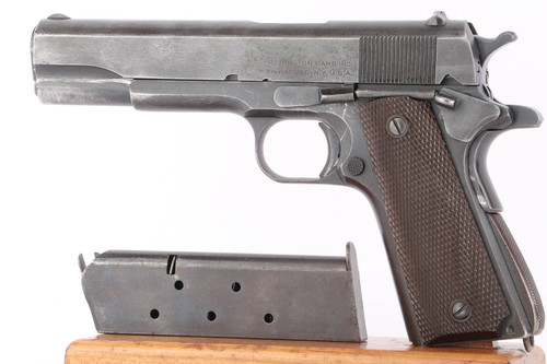 1943 Remington Rand 1911A1 2nd variation .45 ACP pistol - left side view with L marked magazine