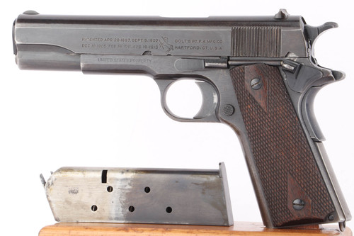 1918 Black Army Colt Model 1911 .45 ACP pistol - left side view with two-tone magazine