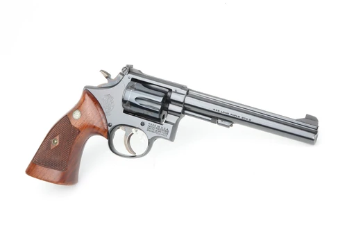 1958 Smith & Wesson Model 17 .22 LR revolver - right side profile with checkered walnut grips