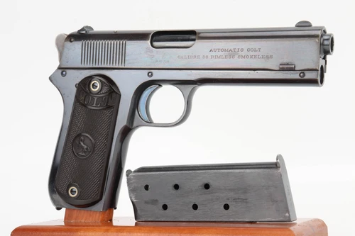 1904 Colt Model 1903 Pocket Hammer .38 - right side profile with magazine