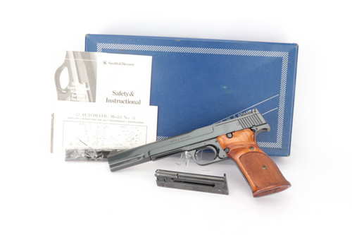 Smith & Wesson Model 41 .22 LR pistol - shown with its original box, manuals and magazine