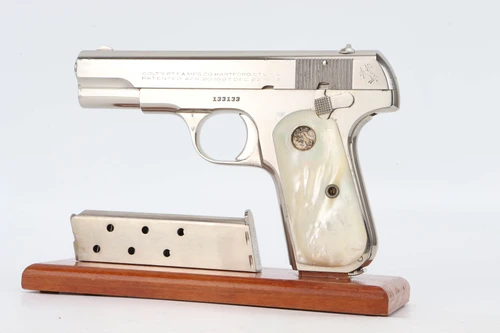 1940 factory nickel Colt Model 1908 Pocket Hammerless .380 pistol - left side with mother of pearl grips