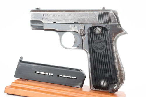 WW2 Nazi Unique Kriegsmodell 7.65mm pistol - left side view with its magazine