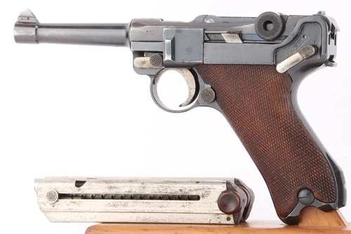 KL marked 1933 Luger 9mm - left side view with matching magazine