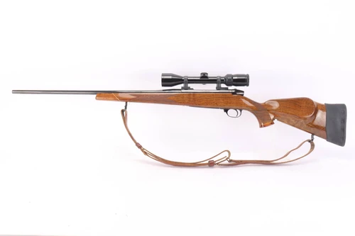 Weatherby Mark V .300 Weatherby Magnum rifle - left profile with scope and leather sling