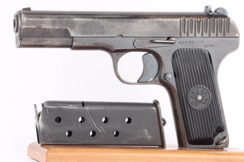 1935 Soviet Tokarev TT-33 7.62x25 pistol - left side view with magazine