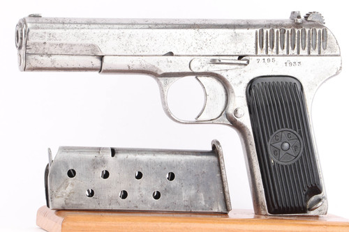 1933 Soviet Tokarev TT-30 7.62x25 pistol - left side view with magazine