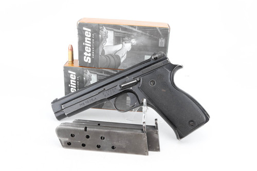French SACM Mle 1935A 7.65 French Long pistol - shown with two boxes of Steinel ammo and magazine