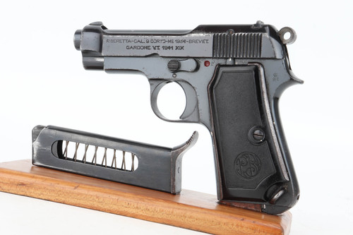 1941 Beretta Model 1934 .380 ACP pistol - left side view with magazine
