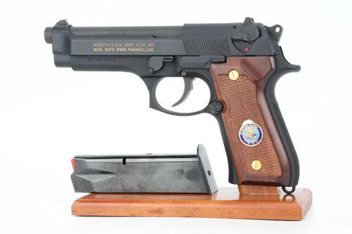Beretta 92FS FBI National Academy 9mm pistol left side on display stand