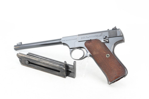 1931 Colt Woodsman .22 LR pistol left side with magazines