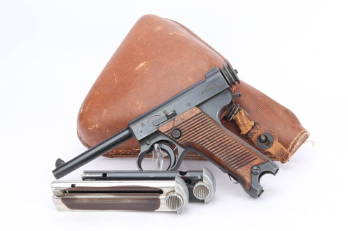 1942 Nambu Type 14 rig with two magazines and rubberized canvas holster