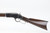 1883 Winchester Model 1873 rifle - left side receiver and buttstock
