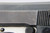 End-of-production dural Walther PPK with black grip and box magazine - right side frame close-up
