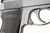 .22 caliber Walther PP with box and accessories - left side grip close-up