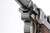 Unit marked DWM Sneak Luger - front view of toggle close-up