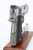 Colt Defender Series 90 Lightweight pistol with box - rear view on display stand