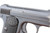 C.G. Haenel Schmeisser Model 1 pistol - left side grip logo close-up