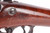 1891 Springfield Model 1884 Trapdoor rifle with ramrod bayonet - stock and cartouche close-up