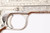 1979 Nickel Engraved Colt Government Model Series 70 - close-up of engraved left side frame and trigger