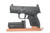 Mint FN 509 9mm Luger - left side with magazines