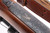 1950 Winchester Model 70 .257 Roberts - close-up of engraved floorplate with gold deer inlay