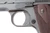 1914 Colt Government Model 1911 .45 - left frame, trigger and checkered wood grip detail