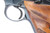 1957 Colt Woodsman third series .22 LR pistol - right grip panel and trigger close-up
