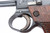 Large trigger guard and straw-colored trigger on the transitional Nambu