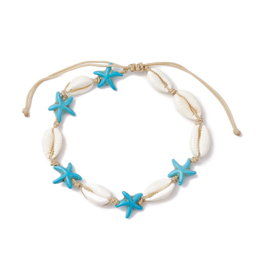 Cowrie Shell and Aqua Howlite Starfish adjustable bracelet on a white background