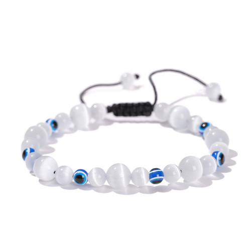 Opalite Evil Eye Cord Bracelet on white background Opalite Evil Eye Cord Bracelet on white background