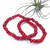 Red (Dyed) Shell Bead Stretch Bracelets on white background with air plant behind
