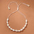 Cowrie Shell 45-65cm White Braided Cord Adjustable Necklace on a tan background