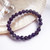 Chevron Amethyst 6mm Bead Stretch Bracelet with shell behind