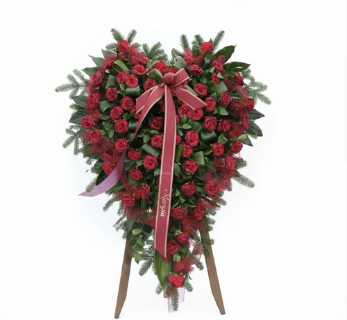Heart-shaped floral arrangement with red rosesپایه گل قلبی شکل با رز قرمز