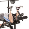 The Marcy Club Deluxe Mid Size Bench MKB-869 in use - leg curls