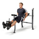 The Marcy Weight Bench 80lb Weight Set MD-2080 in use - leg extensions