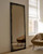 Aged floor mirror