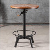 Whiskey bar table in a small tavern, with a rotating circular wooden top and metal base that can be easily adjusted by a crank