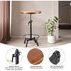 Whiskey bar table in a small tavern, with a rotating circular wooden top and metal base that can be easily adjusted by a crank