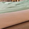 Warm and breathable mattress cushion 