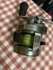 USED CALCUTTA CONQUEST DC 201 BAITCASTING FISHING REEL LEFT HAND IDC5 DIGITAL CONTROL BAITCAST Round Cast Reel