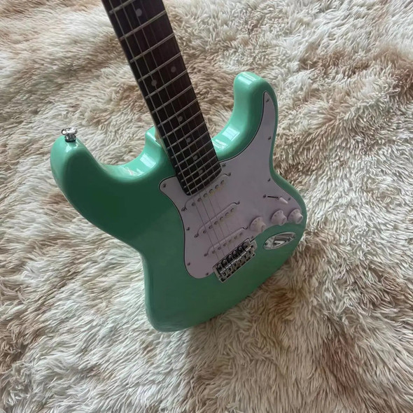 Split electric guitar, surfing green high gloss, single pickup, silver accessories, real factory pictures, can be modified and c Split electric guitar, surfing green high gloss, single pickup, silver accessories, real factory pictures, can be modified and c